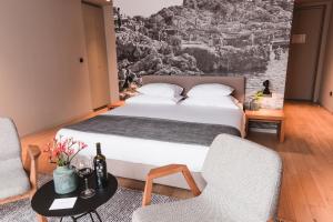 Deluxe Double Room with Balcony room in One Suite Hotel