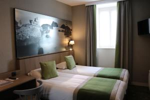 Hotels Le Mouton Blanc : photos des chambres