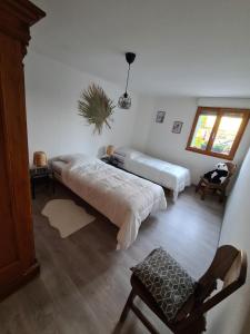 Appartements Agreable appartement avec Spa proche de la foret : photos des chambres