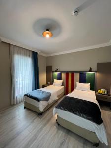 Deluxe Triple Room room in PORDANİS HOTEL