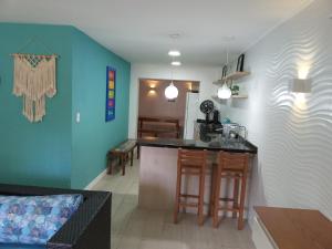 Apartamento Praia Enseada Guarujá Wilma - próximo da praia - com ar condicionado e vaga para carro