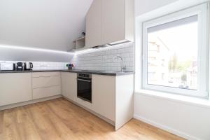 TOP street ONE Apartments, by Cohost