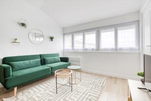 Appartements Louvres Elegance : photos des chambres