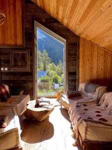 Chalets Mon Roc - Maison de montagne atypique avec vue : photos des chambres