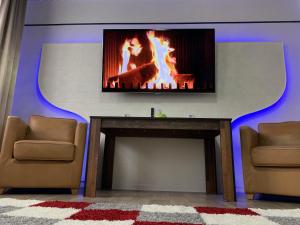 Best-Preis -Gold Suite- mit Netflix, Self-Check-In, eBike Ladestation, Fahrradraum, WLAN, Netflix und Massagesessel - direkt am Elberadweg im Herzen von Wittenberge