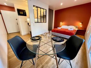 Appartements Studio avec grande terrasse et parking privatifs : photos des chambres