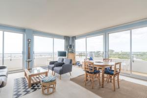 Appartements Appartement avec vue panoramique sur la baie : photos des chambres