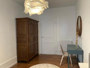 Appartements Appartement avec place de parking et box velos : photos des chambres