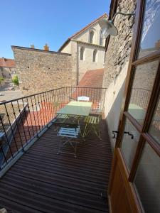 Appartements La Mansarde De L Abbaye : photos des chambres