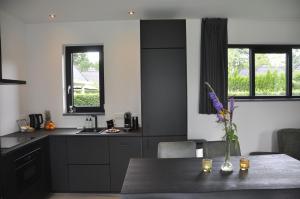 The Black Oak - Luxe bungalow met prive sauna