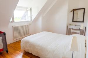 Maisons de vacances Treffiagat - Grande maison pour 9 - Jardin : photos des chambres