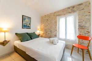 Appartements Le Clocher par Dodo-a-Cassis : photos des chambres