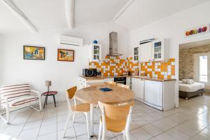 Appartements Le Clocher par Dodo-a-Cassis : photos des chambres