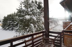 Chalets Au coin du feu : photos des chambres