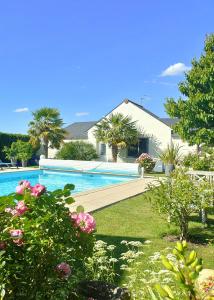 Maisons de vacances Gite pause au jardin : photos des chambres