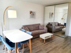 Appartements Le bord de plage : photos des chambres