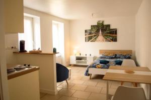 Appartements studio cosy confortable et chaleureux : photos des chambres