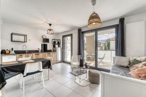 Appartements Emergence - Beau T1 pour 2 personnes balcon et garage : photos des chambres