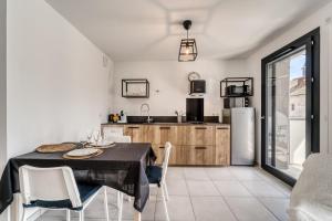 Appartements Emergence - Beau T1 pour 2 personnes balcon et garage : photos des chambres