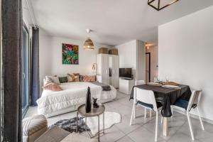 Appartements Emergence - Beau T1 pour 2 personnes balcon et garage : photos des chambres