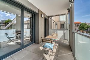 Appartements Emergence - Beau T1 pour 2 personnes balcon et garage : photos des chambres