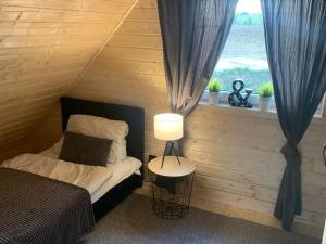 Cottage by the lake in Jelenska Huta