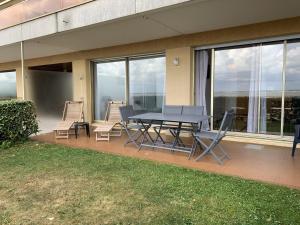 Appartement T2 RDC avec Jardinet et Accès Direct Plage, Parking Sécurisé, Proche Commerces - FR-1-374-2