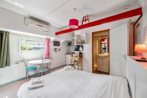 Appartements Studio sur Peniche, Le Cormoran, Bord De Saone A Lyon : photos des chambres