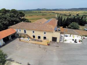 Maisons de vacances Grande maison familiale avec piscine couverte : photos des chambres