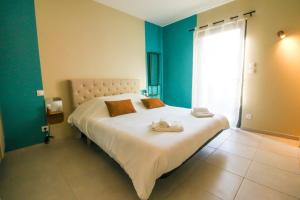 Appartements Le Celya, Jacuzzi et Parking Privatif avec Borne de Recharge Voiture Electrique : photos des chambres