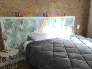 Appartements Appartement Cogny - les Meubles des Pierres Dorees : photos des chambres