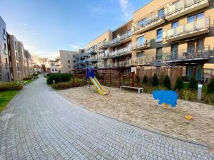 Słoneczny apartament nad morzem z tarasem na dachu