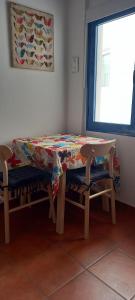 Casa Pescado y mariposas