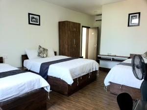 Phòng Đôi hoặc Hai Giường Đơn Loại Sang (Deluxe Double or Twin Room)