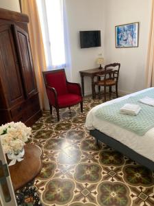 Hotels Hotel La Demeure Coloniale : photos des chambres