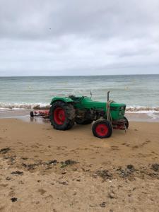 Maisons de vacances La plage au bout du jardin / Sword Beach cottage : photos des chambres