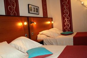 Hotels Hotel Capricorne : Chambre Quadruple