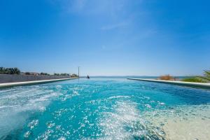 JamC Dream Familientraum direkt am Meer mit beheiztem Pool