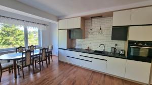 Apartament Riviera z widokiem na kanał Augustowski