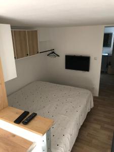 Appartements Studio Cosy, Jacuzzi et petit dejeuner : photos des chambres