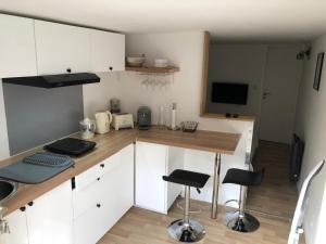 Appartements Studio Cosy, Jacuzzi et petit dejeuner : photos des chambres