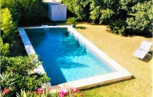 Maisons de vacances Awesome home in Saint-Quentin-la-Poter with Outdoor swimming pool, WiFi and 3 Bedrooms : photos des chambres