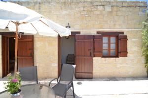 One-Bedroom Apartment room in Elpida's Stone Houses