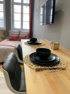Appartements Studio Vieux Valenciennes : photos des chambres