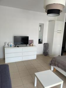 Appartements Beau F1 climatise et wifi en bord de mer : photos des chambres