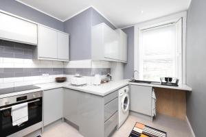 JOIVY Charming Apartment near Leith Links with Patio