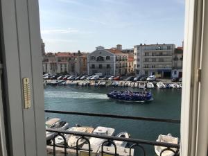 Appartements appartquaisete et garage : photos des chambres