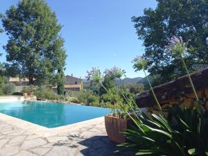 Maisons de vacances Gite en Cevennes du sud, bergerie restauree, 2 a 4 personnes, piscine, vue exceptionnelle, authenticite et confort : photos des chambres