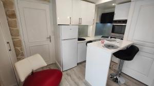Appartements Le Petit Paradis : photos des chambres