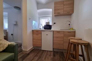 Renovated Condo w Queen Bed Green Patio and 42 TV